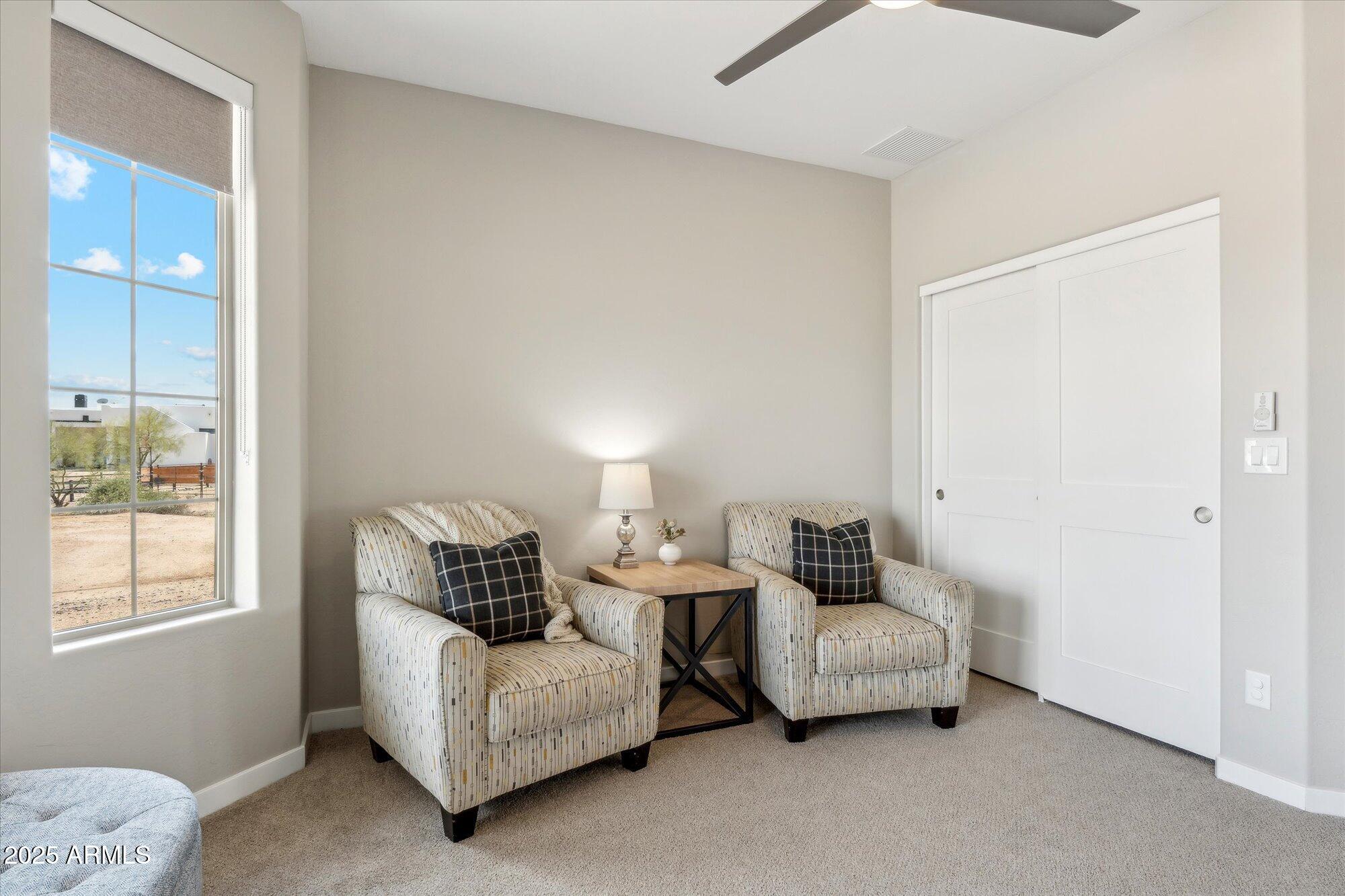 27420 North 170th Street Rio Verde, AZ 85263 - Photo 23 of 39 a living room with furniture and a window
