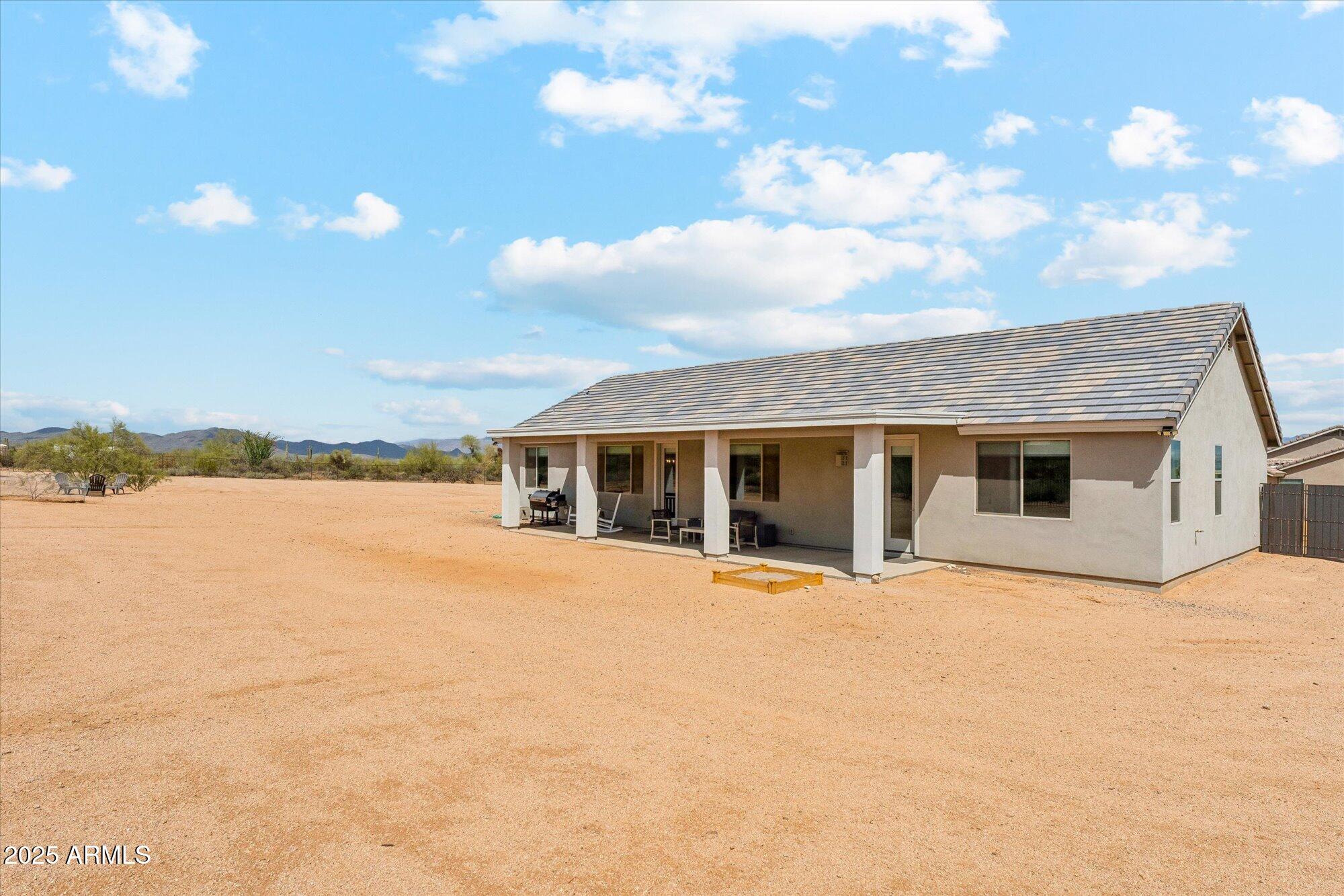 27420 North 170th Street Rio Verde, AZ 85263 - Photo 25 of 39 a view of house with yard and lake view