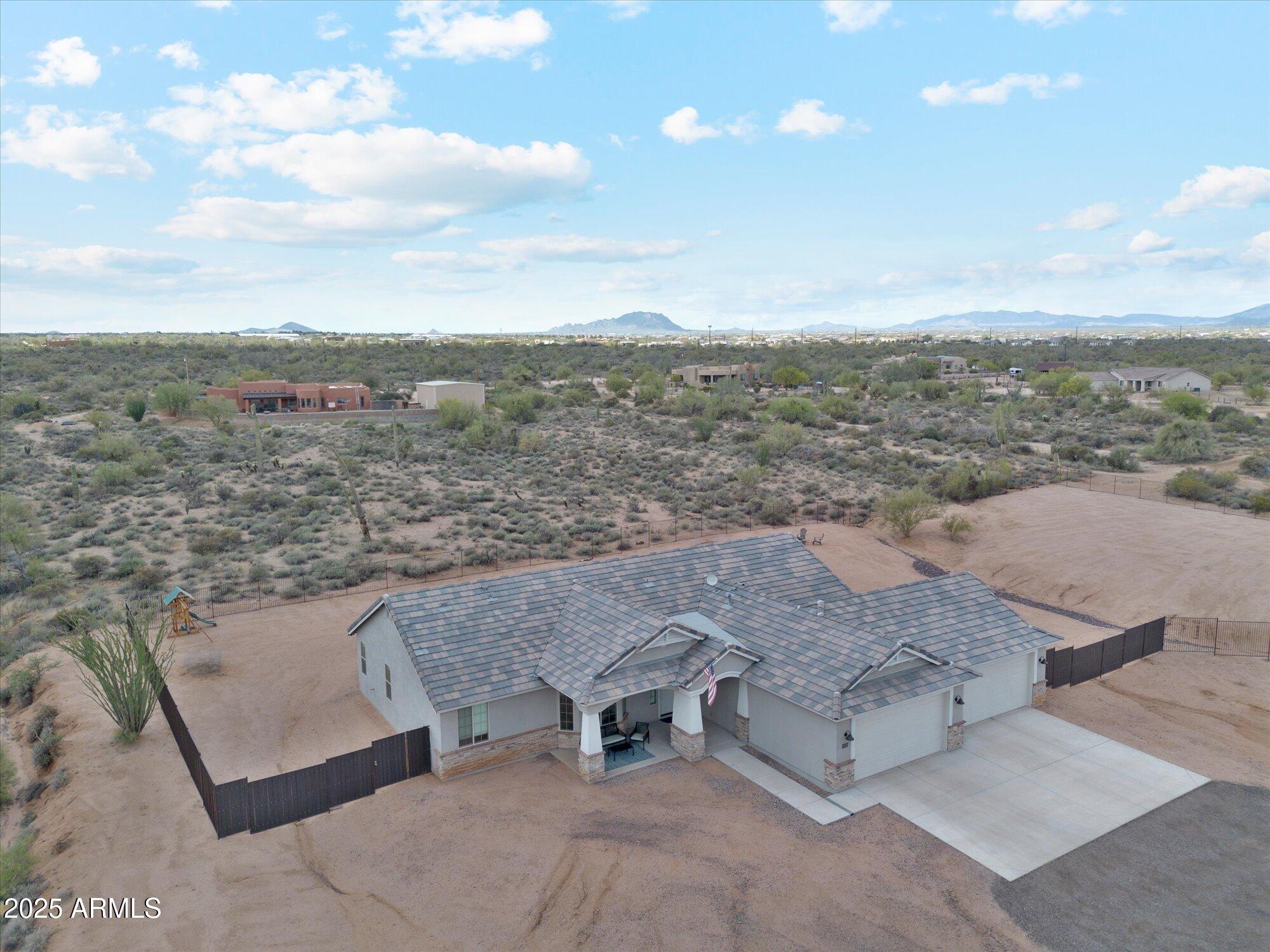 27420 North 170th Street Rio Verde, AZ 85263 - Photo 30 of 39 a view of a terrace with yard and mountain view in back