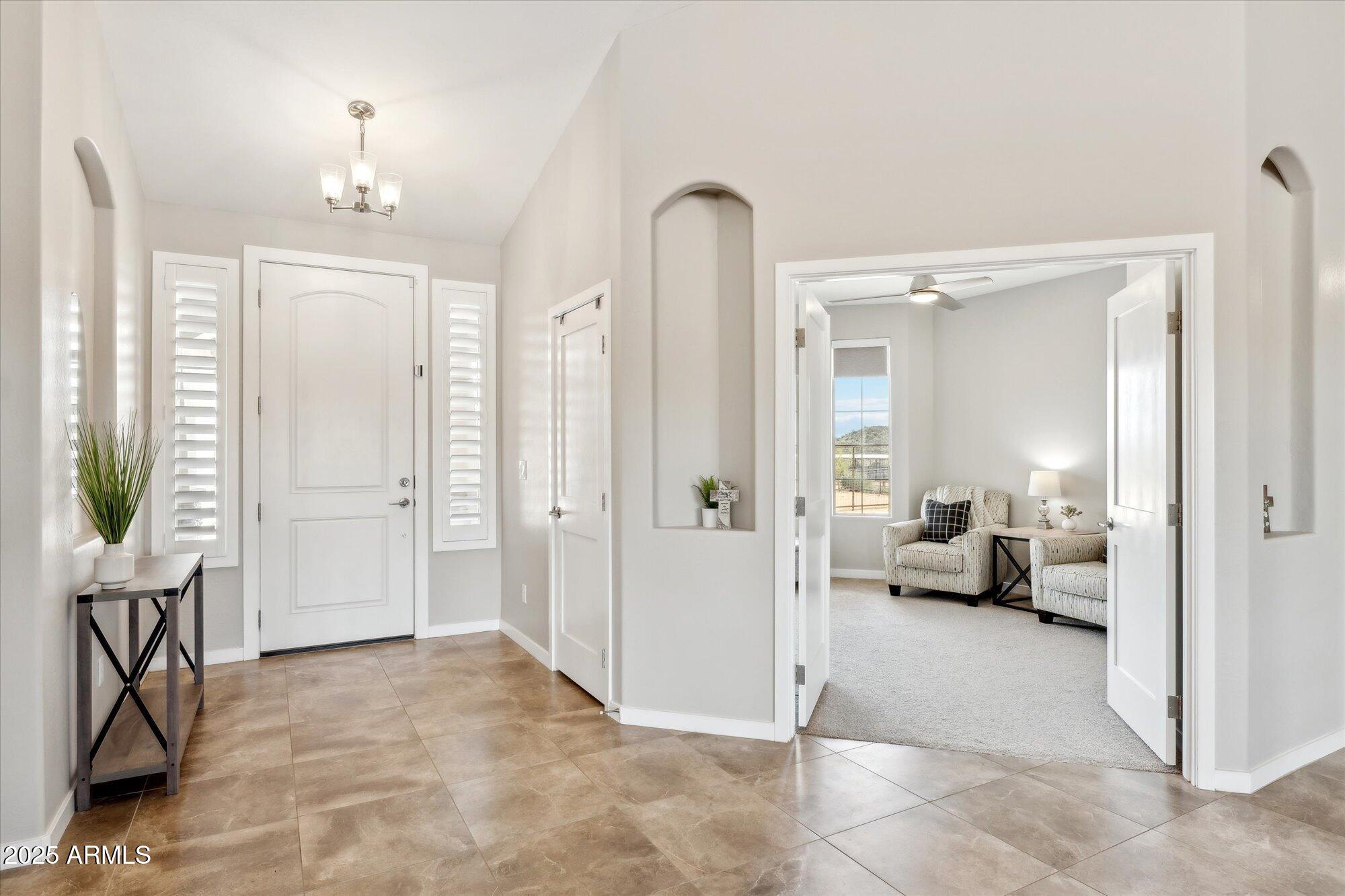 27420 North 170th Street Rio Verde, AZ 85263 - Photo 3 of 39 a view of a livingroom with furniture and windows