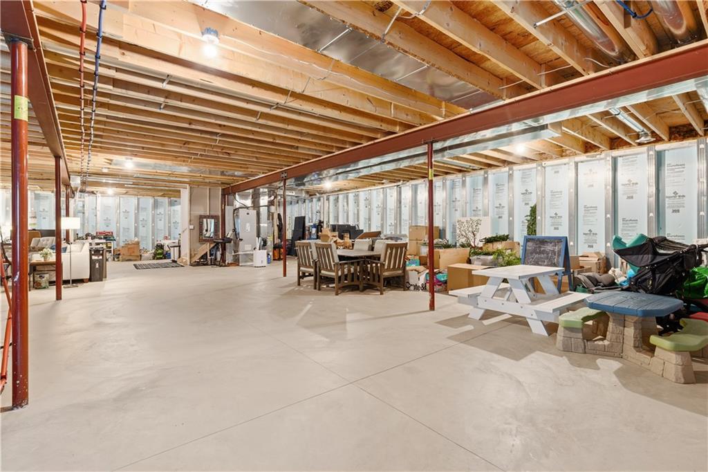 315 Stewarton Road Mill Run, PA 15464 - Photo 40 of 47 a view of a patio with table and chairs and couches with wooden roof and stairs