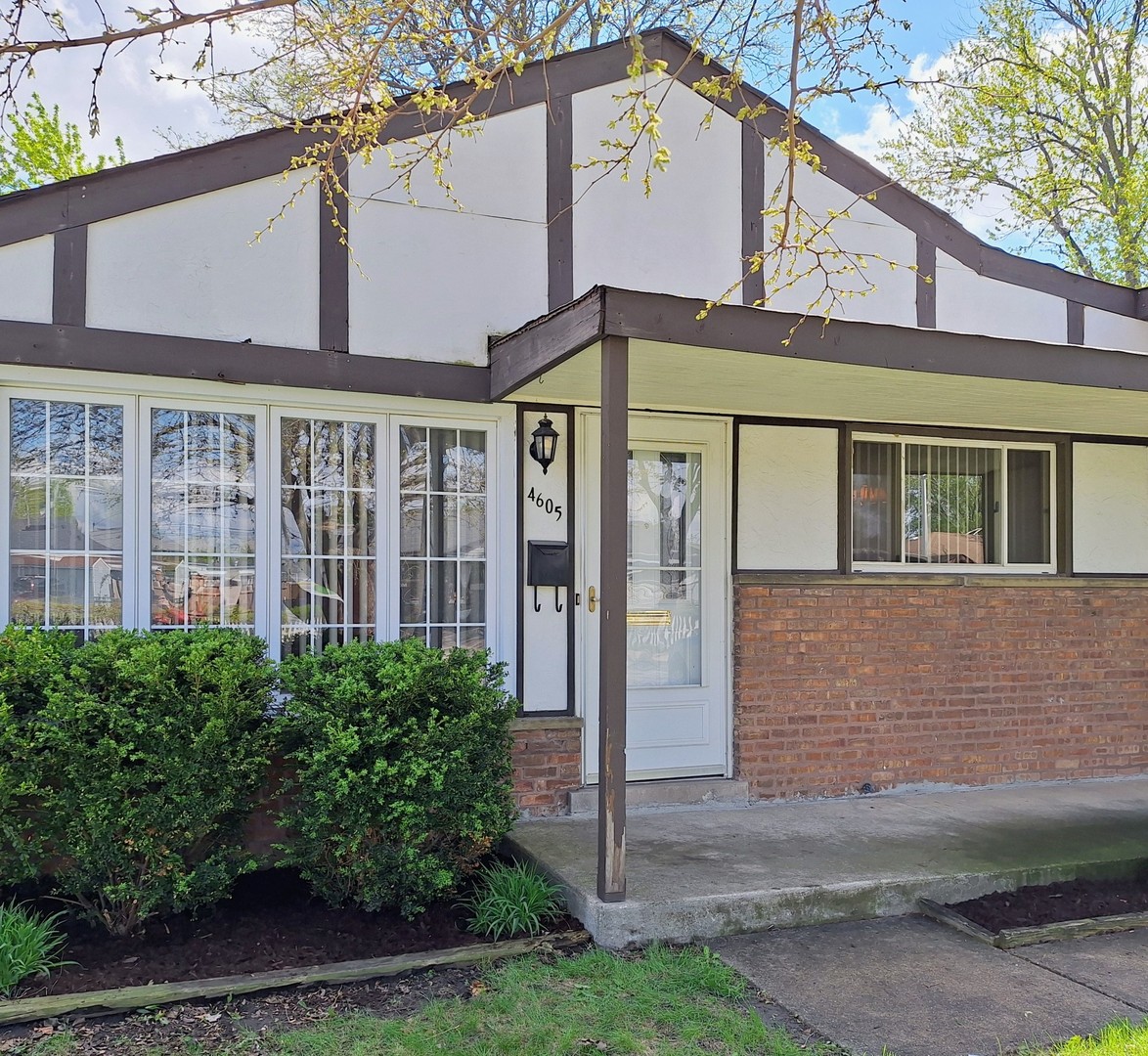 4605 West 84th Place Chicago, IL 60652 - Photo 2 of 30 a view of a building with a yard