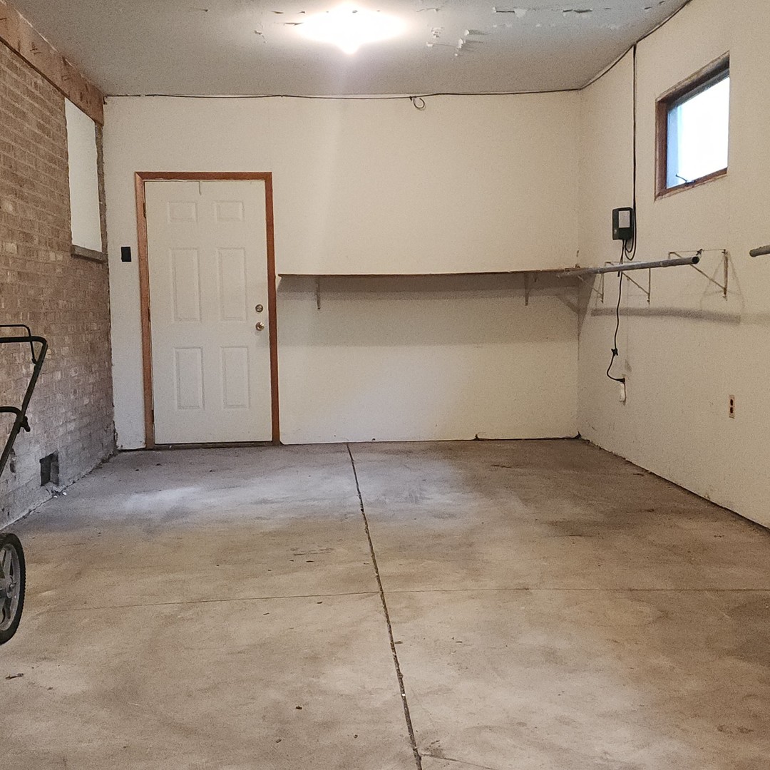 4605 West 84th Place Chicago, IL 60652 - Photo 28 of 30 a view of a room with rack on the wall