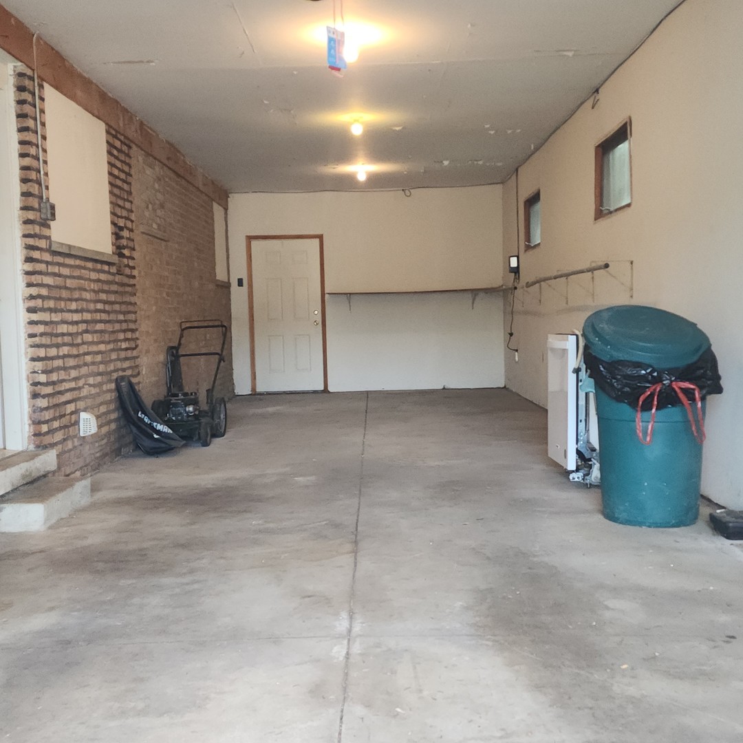 4605 West 84th Place Chicago, IL 60652 - Photo 29 of 30 a view of a room with gym equipment
