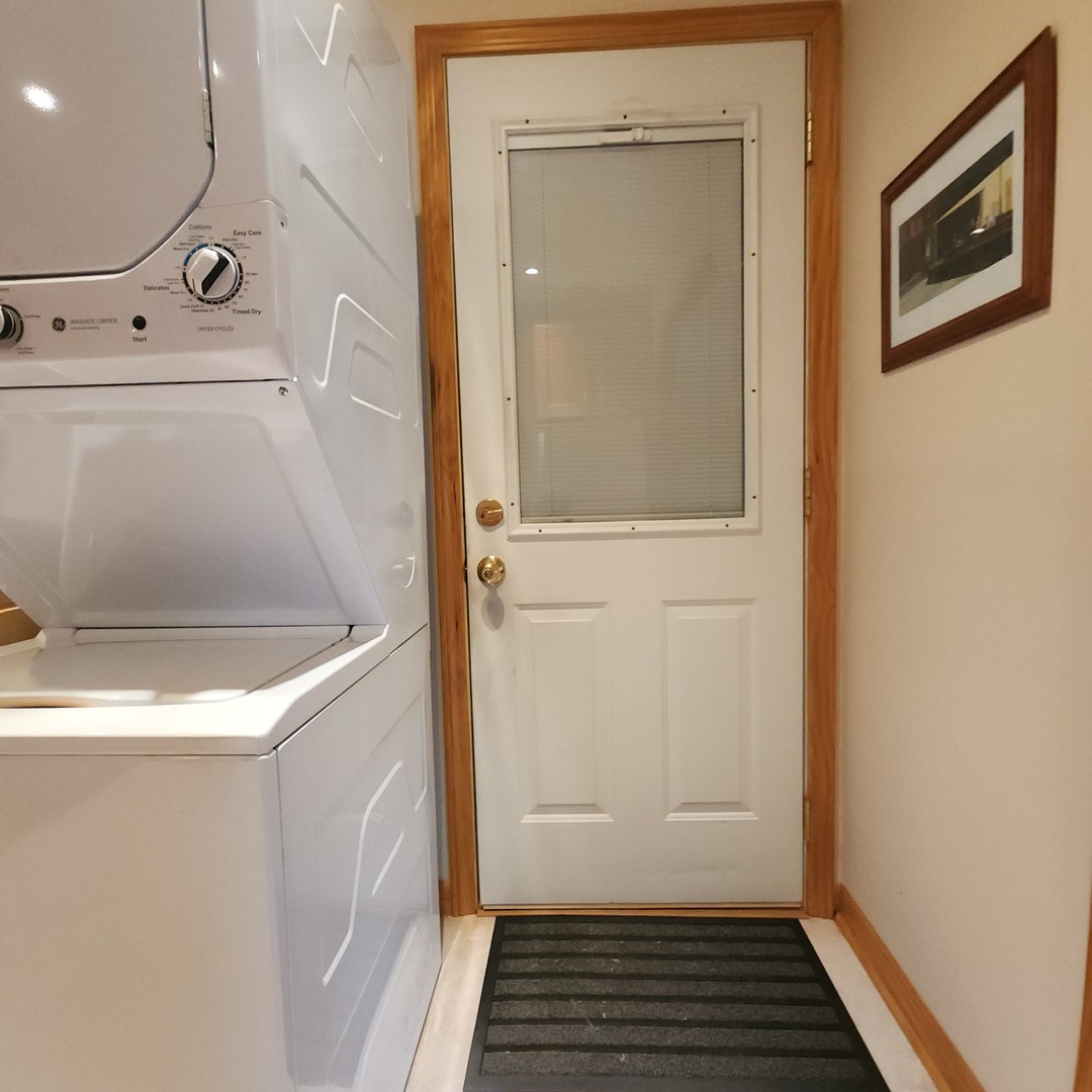 4605 West 84th Place Chicago, IL 60652 - Photo 10 of 30 a bathroom with a sink and a mirror