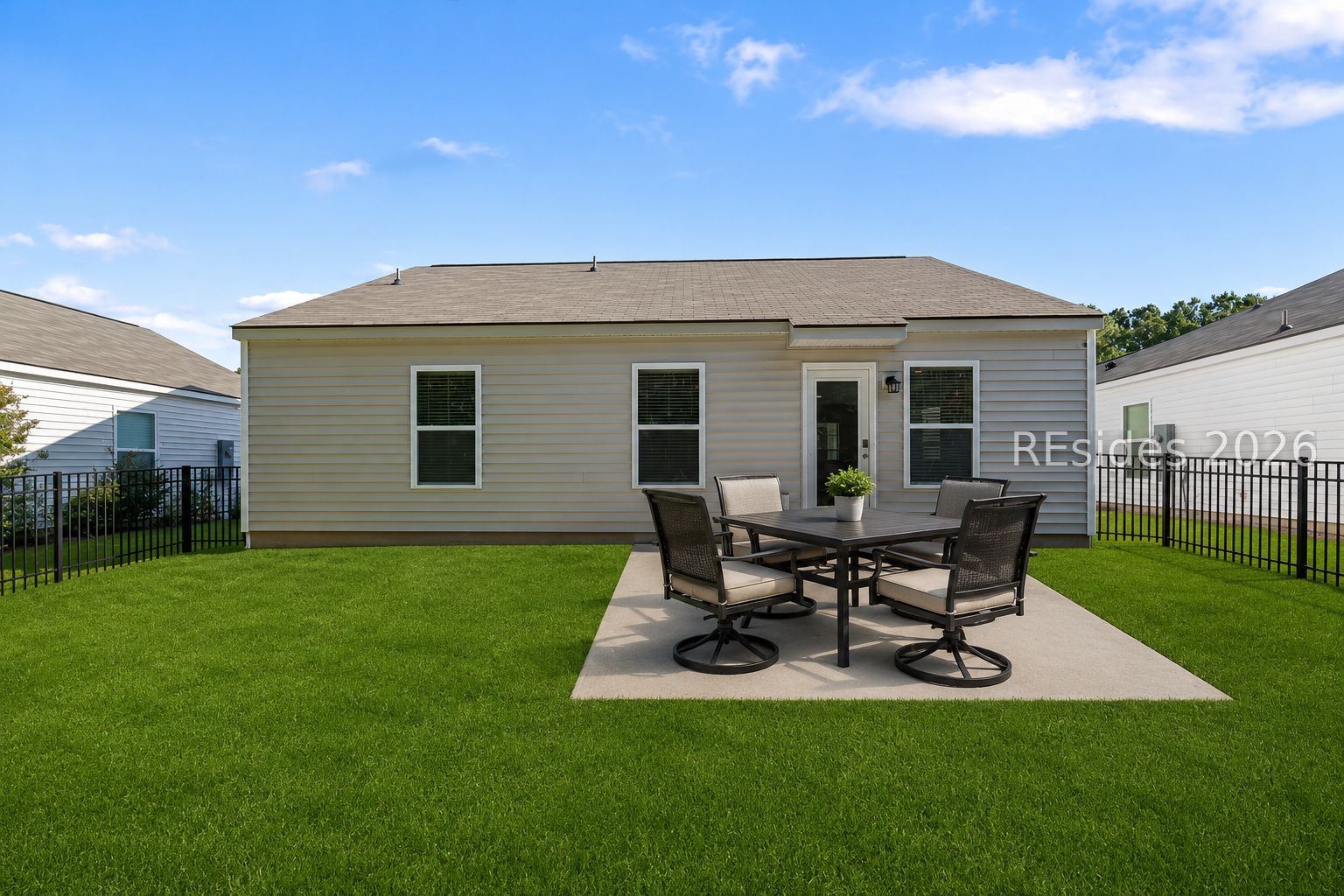 86 Rudy Drive Hardeeville, SC 29927 - Photo 16 of 17 Back Patio and Yard Virtually Staged