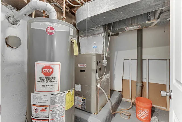 a utility room with multiple dryer and washer