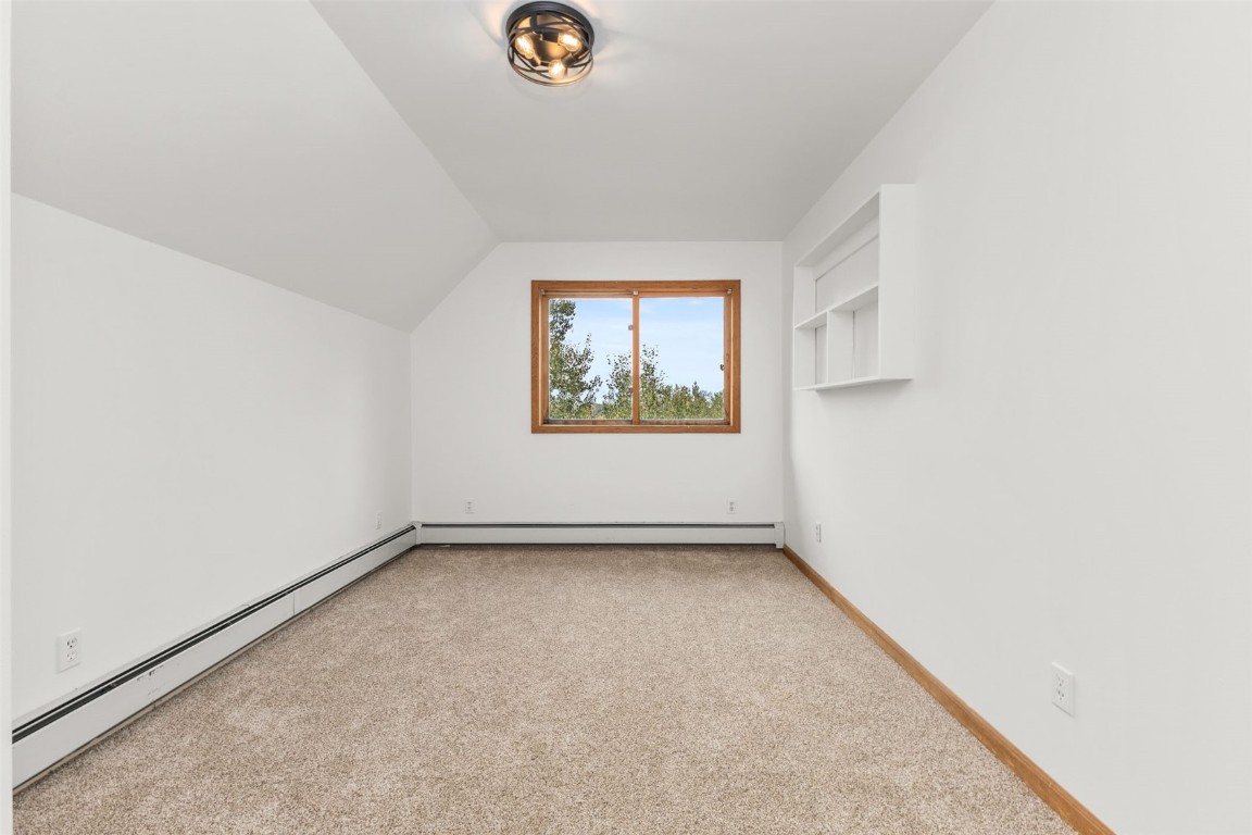 25065 Aspen Way Clark, CO 80428 - Photo 14 of 50 an empty room with windows