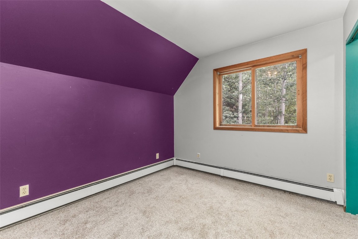 25065 Aspen Way Clark, CO 80428 - Photo 16 of 50 a view of an empty room with a window