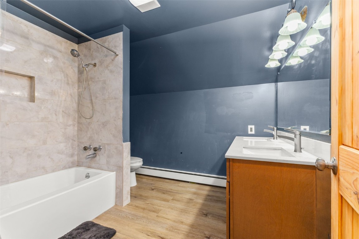 25065 Aspen Way Clark, CO 80428 - Photo 17 of 50 a bathroom with a sink mirror and shower