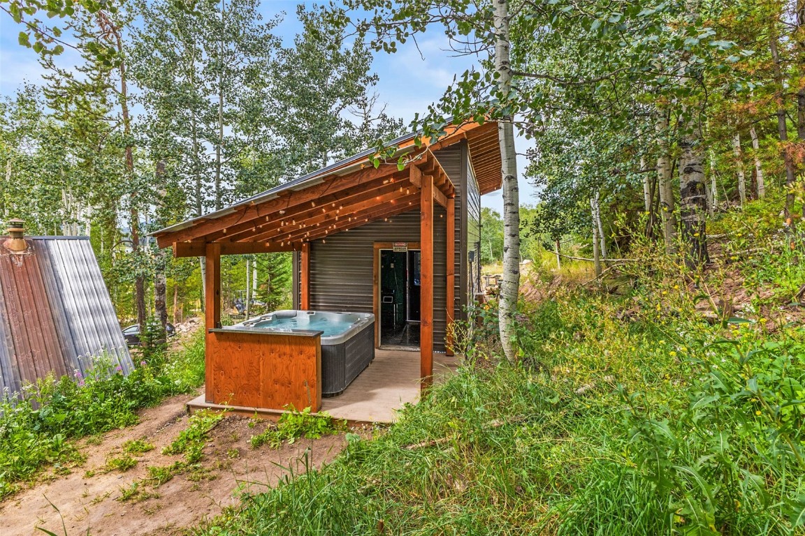 25065 Aspen Way Clark, CO 80428 - Photo 26 of 50 a backyard of a house with seating space