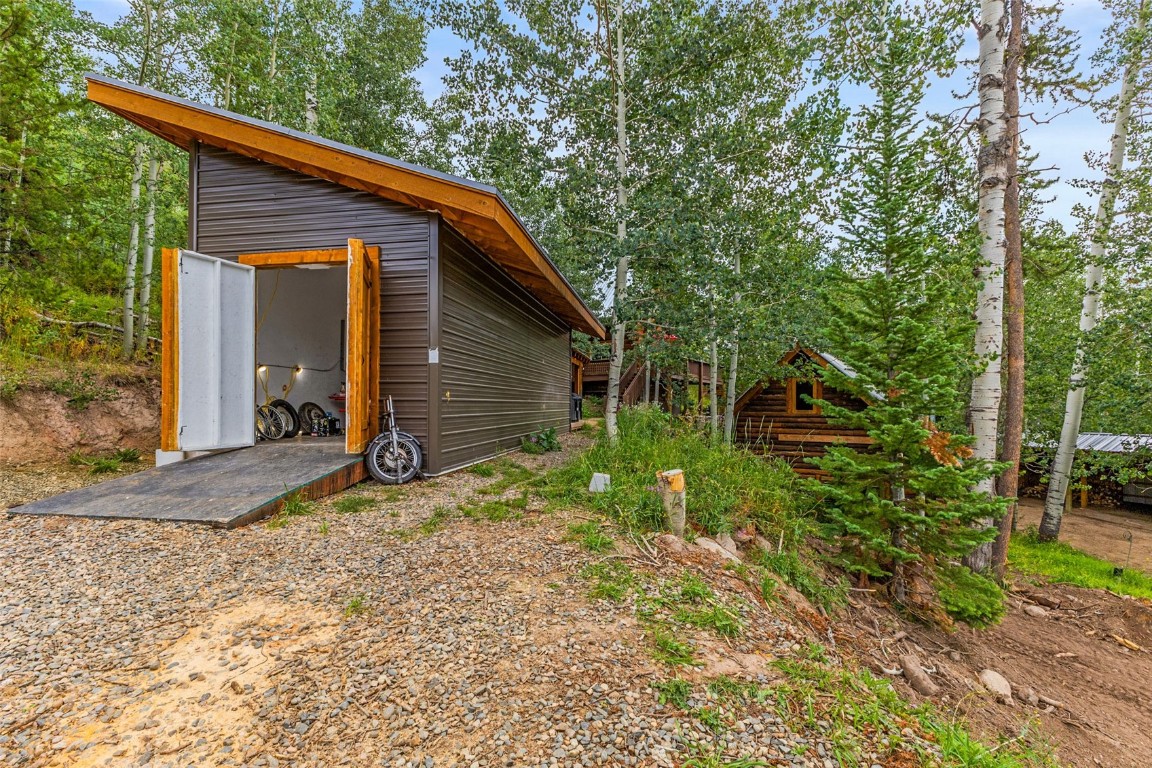 25065 Aspen Way Clark, CO 80428 - Photo 32 of 50 a view of a house with backyard and garden