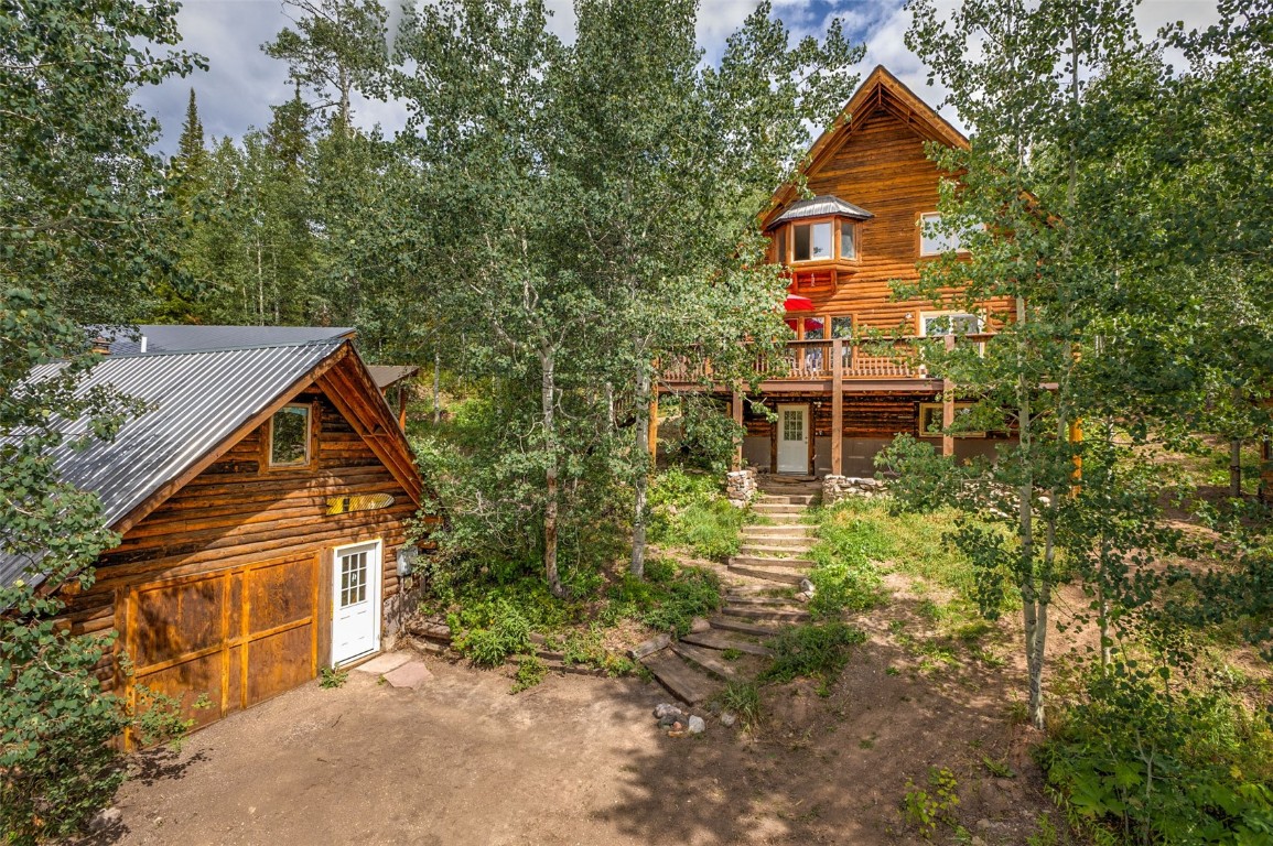 25065 Aspen Way Clark, CO 80428 - Photo 4 of 50 front view of a house with a yard