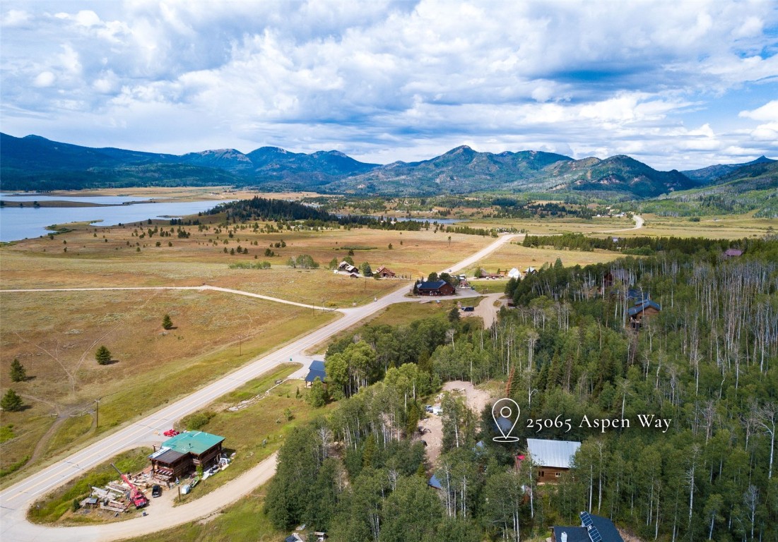 25065 Aspen Way Clark, CO 80428 - Photo 6 of 50 a view of a lake with a mountain in the background