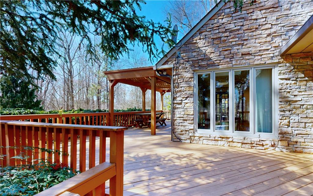 5205 Saddle Brook Road Oak Ridge, NC 27310 - Photo 28 of 50 Real stone gives a luxury look.