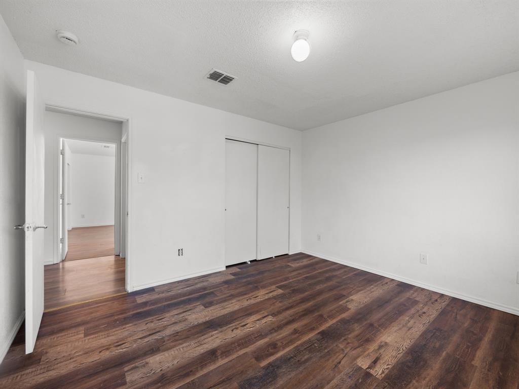 1237 McCary Street Cedar Hill, TX 75104 - Photo 23 of 38 a view of empty room with wooden floor