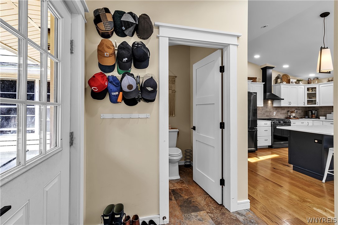 2566 Genesee Road Arcade, NY 14009 - Photo 15 of 50 Partial view of mudroom with half bath. Door exist