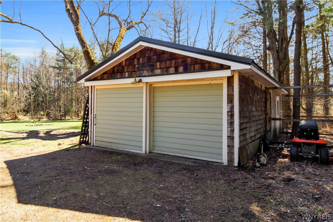 2566 Genesee Road Arcade, NY 14009 - Photo 43 of 50 Extra deep garage with rear chicken coop