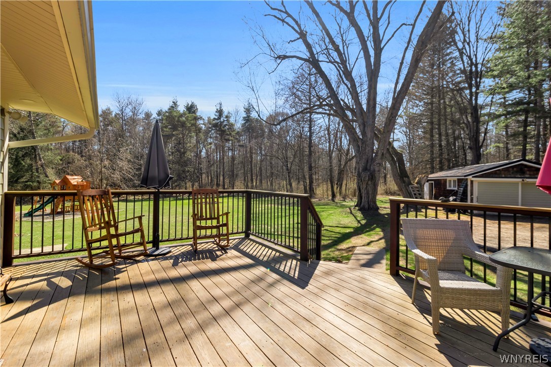 2566 Genesee Road Arcade, NY 14009 - Photo 49 of 50 Side deck with covered entry into mudroom/half bat