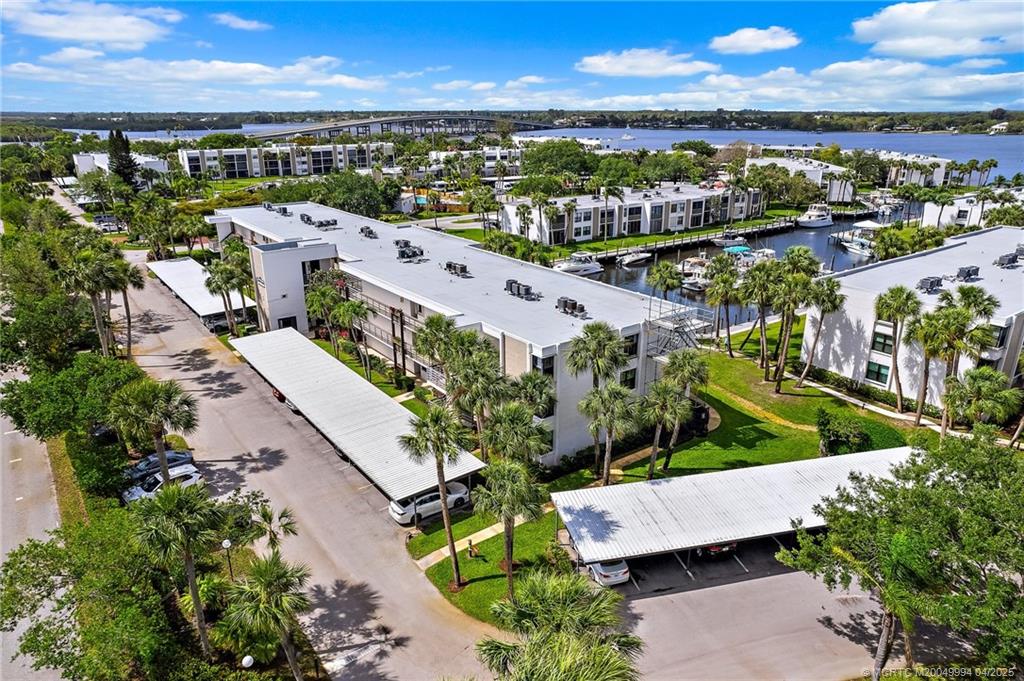 1950 Southwest Palm City Road, Unit 5310 Stuart, FL 34994 - Photo 11 of 72 an aerial view of a house with a yard