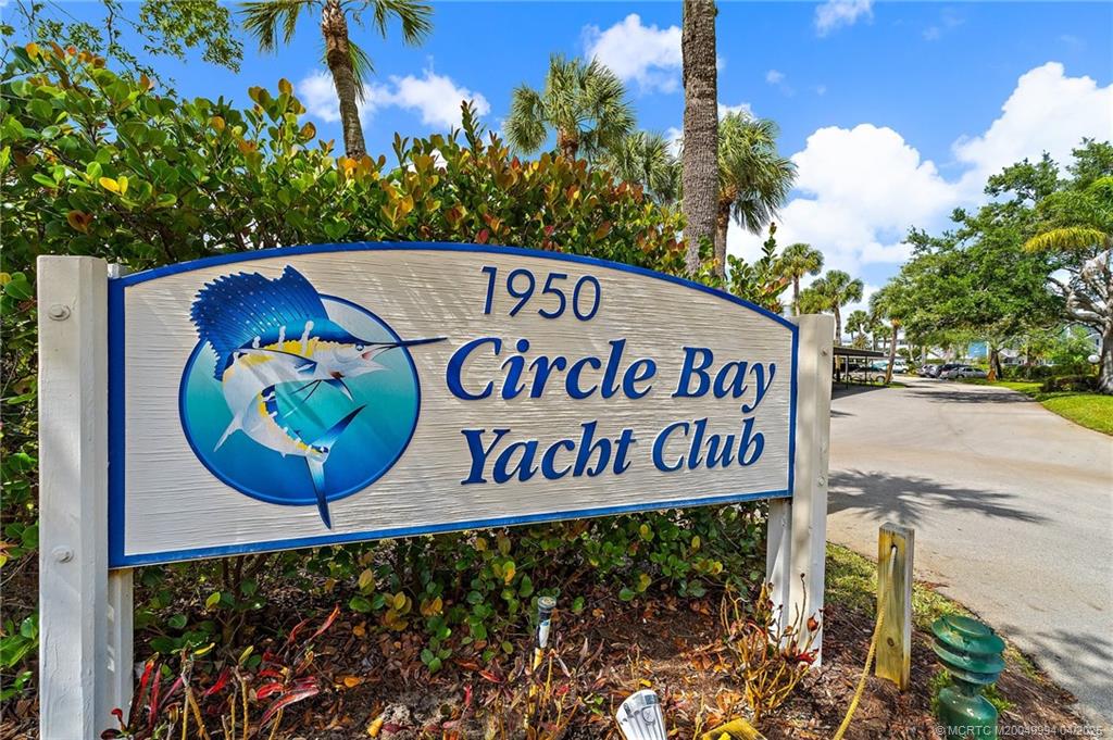 1950 Southwest Palm City Road, Unit 5310 Stuart, FL 34994 - Photo 41 of 72 a sign that is on the side of the road