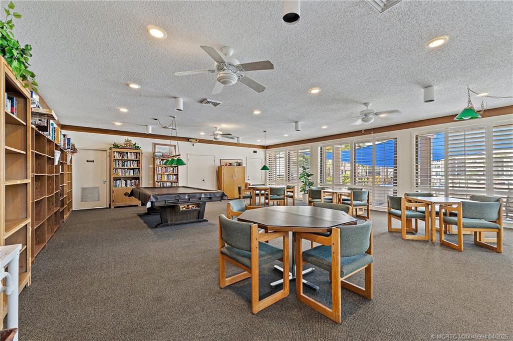 1950 Southwest Palm City Road, Unit 5310 Stuart, FL 34994 - Photo 56 of 72 a view of a dining room with furniture