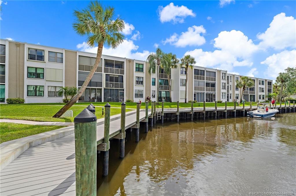 1950 Southwest Palm City Road, Unit 5310 Stuart, FL 34994 - Photo 6 of 72 a view of a swimming pool with a patio