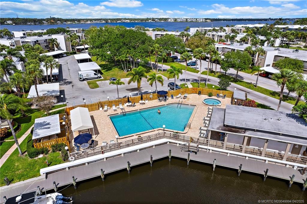 1950 Southwest Palm City Road, Unit 5310 Stuart, FL 34994 - Photo 71 of 72 an aerial view of a house with a yard lake view and mountain view