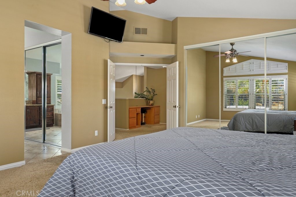 7910 Westgate Court Riverside, CA 92506 - Photo 26 of 61 a bedroom with a bed and a large window