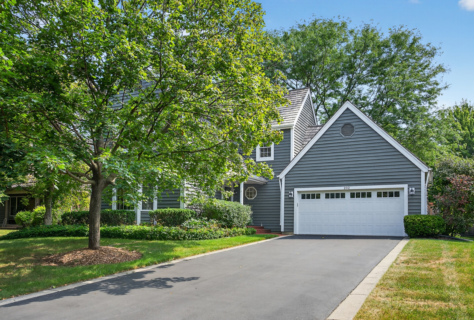 232 Long Hill Road Gurnee, IL 60031 - Photo 1 of 34 a house with trees in the background