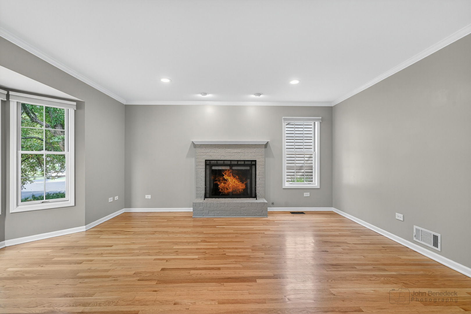 232 Long Hill Road Gurnee, IL 60031 - Photo 7 of 34 a view of an empty room with wooden floor and a window