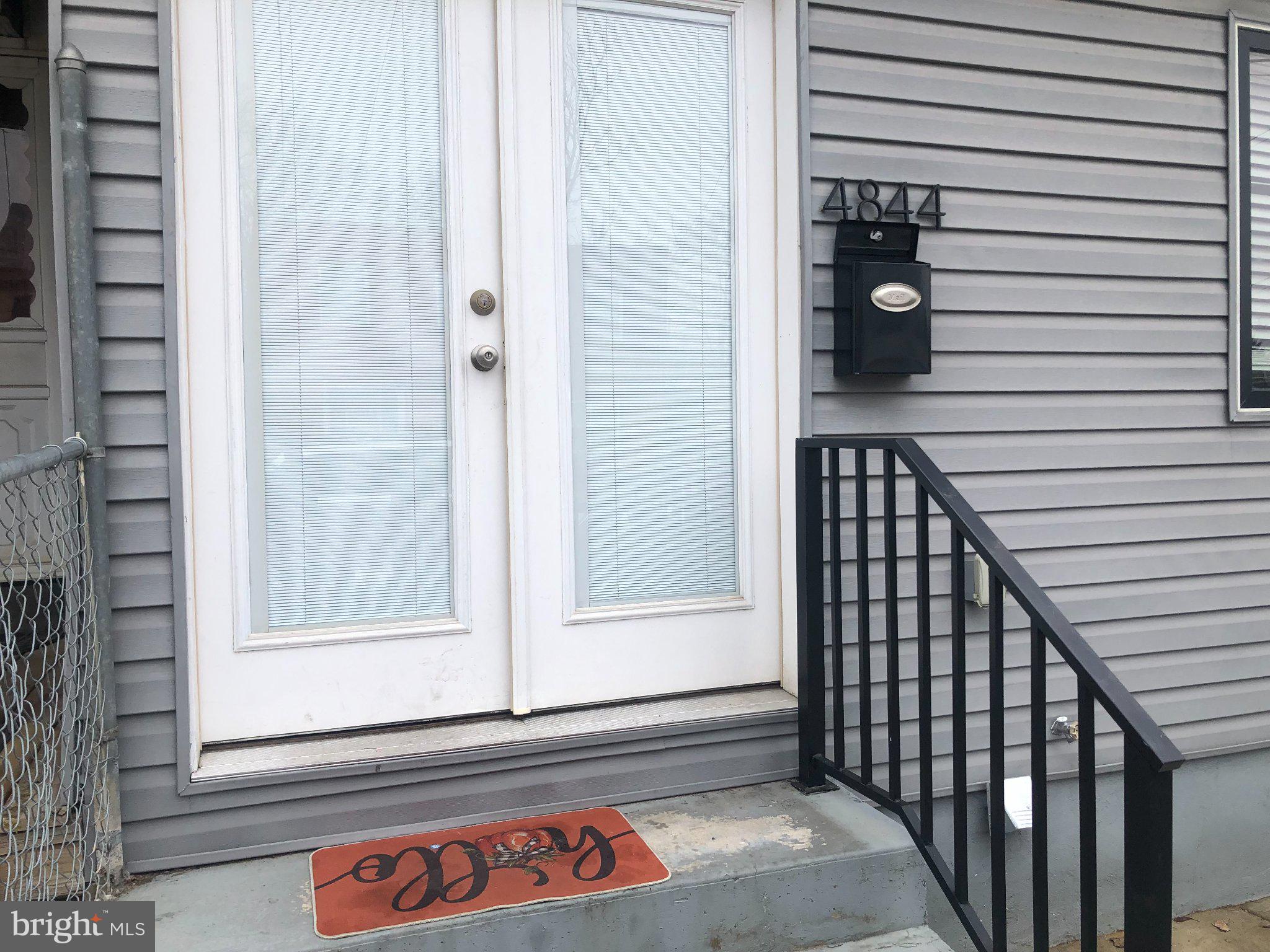 Charming entrance with welcoming vibes.