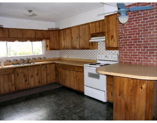 16 Eagleville Road Athol, MA 01331 - Photo 4 of 8 a kitchen with a sink stove and cabinets