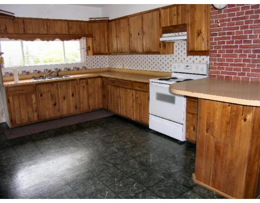 16 Eagleville Road Athol, MA 01331 - Photo 5 of 8 a kitchen with a sink stove and cabinets