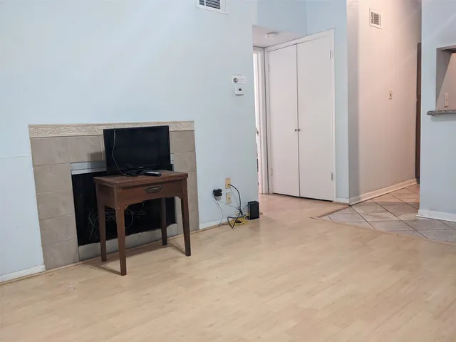 a view of a workspace with furniture