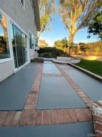 a view of a park with swings and slides