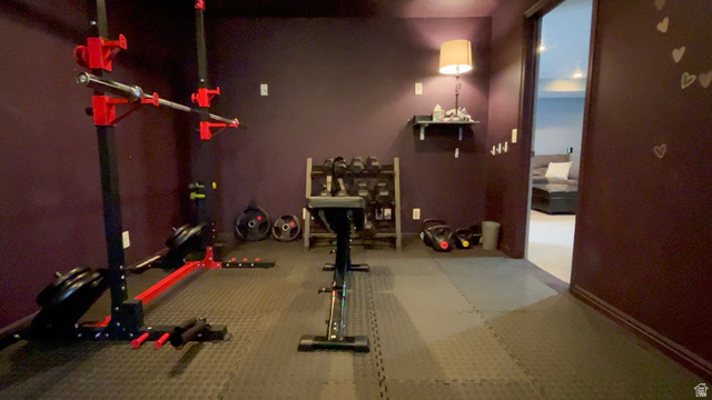 1797 Sunset Road Enoch, UT 84721 - Photo 48 of 80 Dedicated exercise space with resilient flooring and dark-hued walls