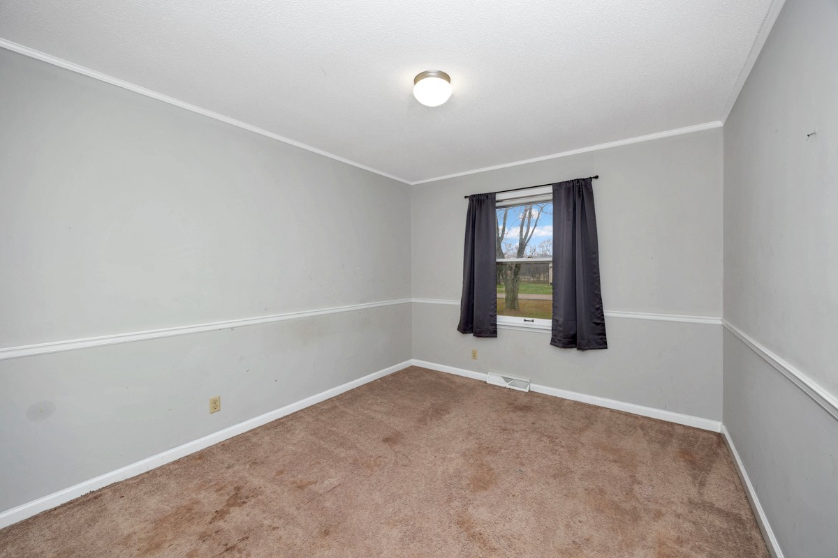 2117 Ardmore Highway Ardmore, TN 38449 - Photo 15 of 32 an empty room with a window