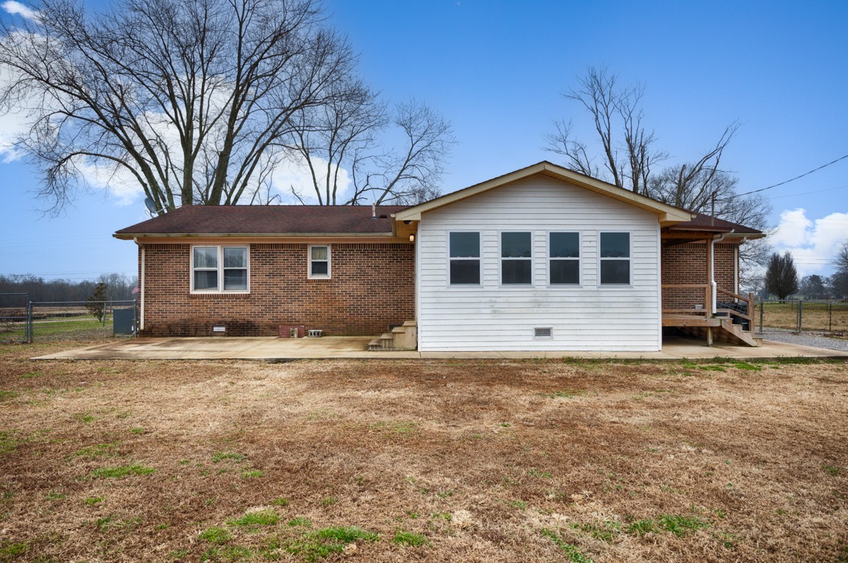 2117 Ardmore Highway Ardmore, TN 38449 - Photo 31 of 32 a front view of a house with a yard