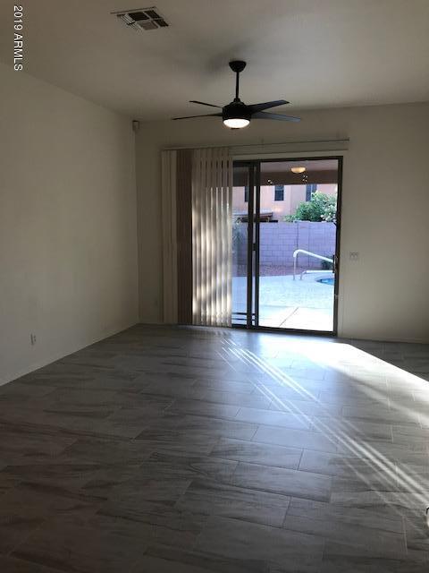 4206 East Rowel Road Phoenix, AZ 85050 - Photo 8 of 16 New Ceiling Fan in Family Room