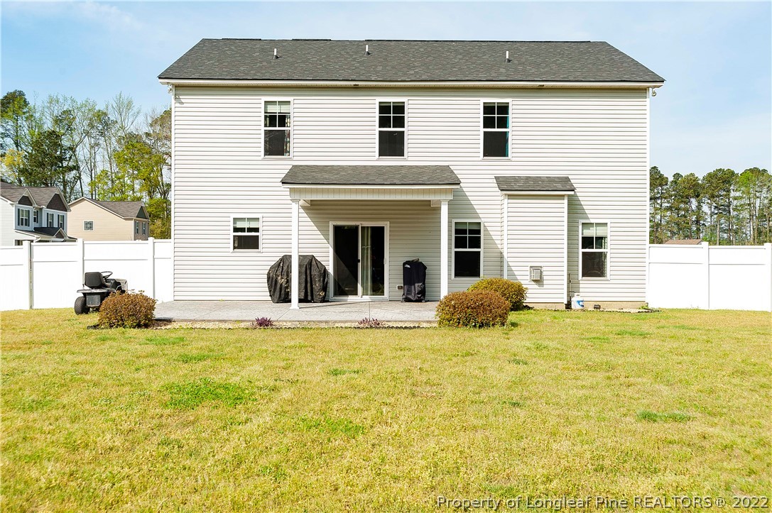 461 St Johns Loop Raeford, NC 28376 - Photo 12 of 50 a view of a house with pool and sitting area