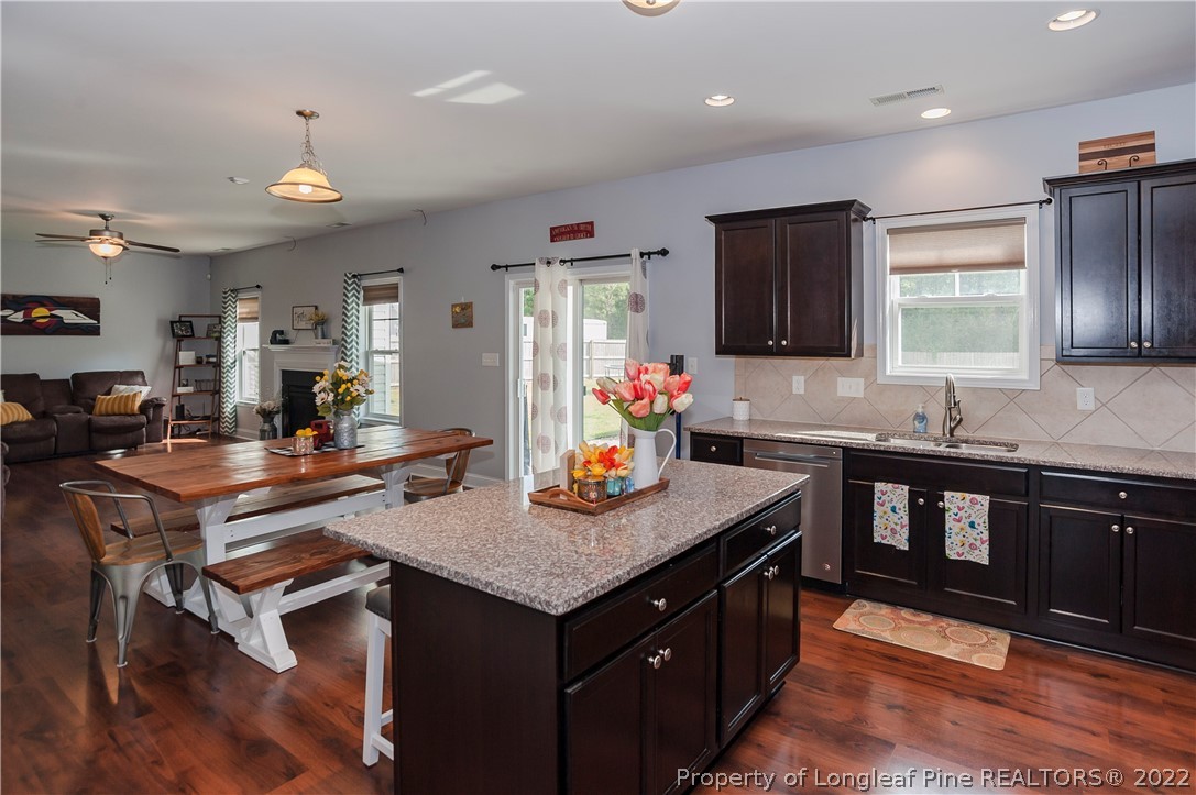 461 St Johns Loop Raeford, NC 28376 - Photo 24 of 50 a kitchen with granite countertop lots of counter top space