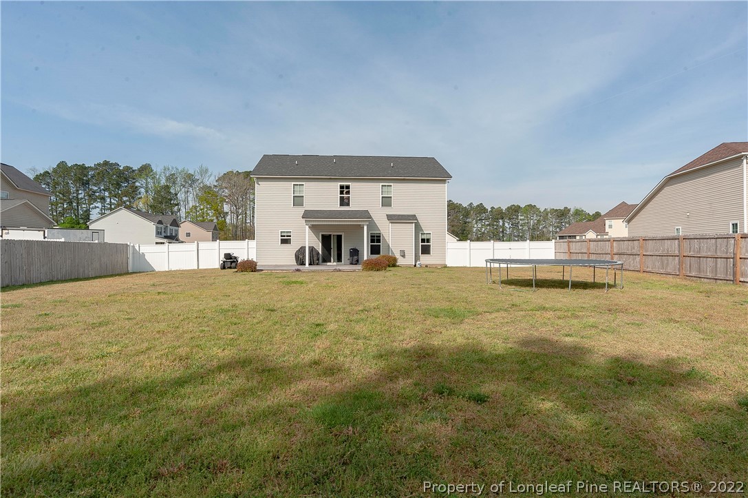 461 St Johns Loop Raeford, NC 28376 - Photo 8 of 50 a house view with swimming pool in front of it