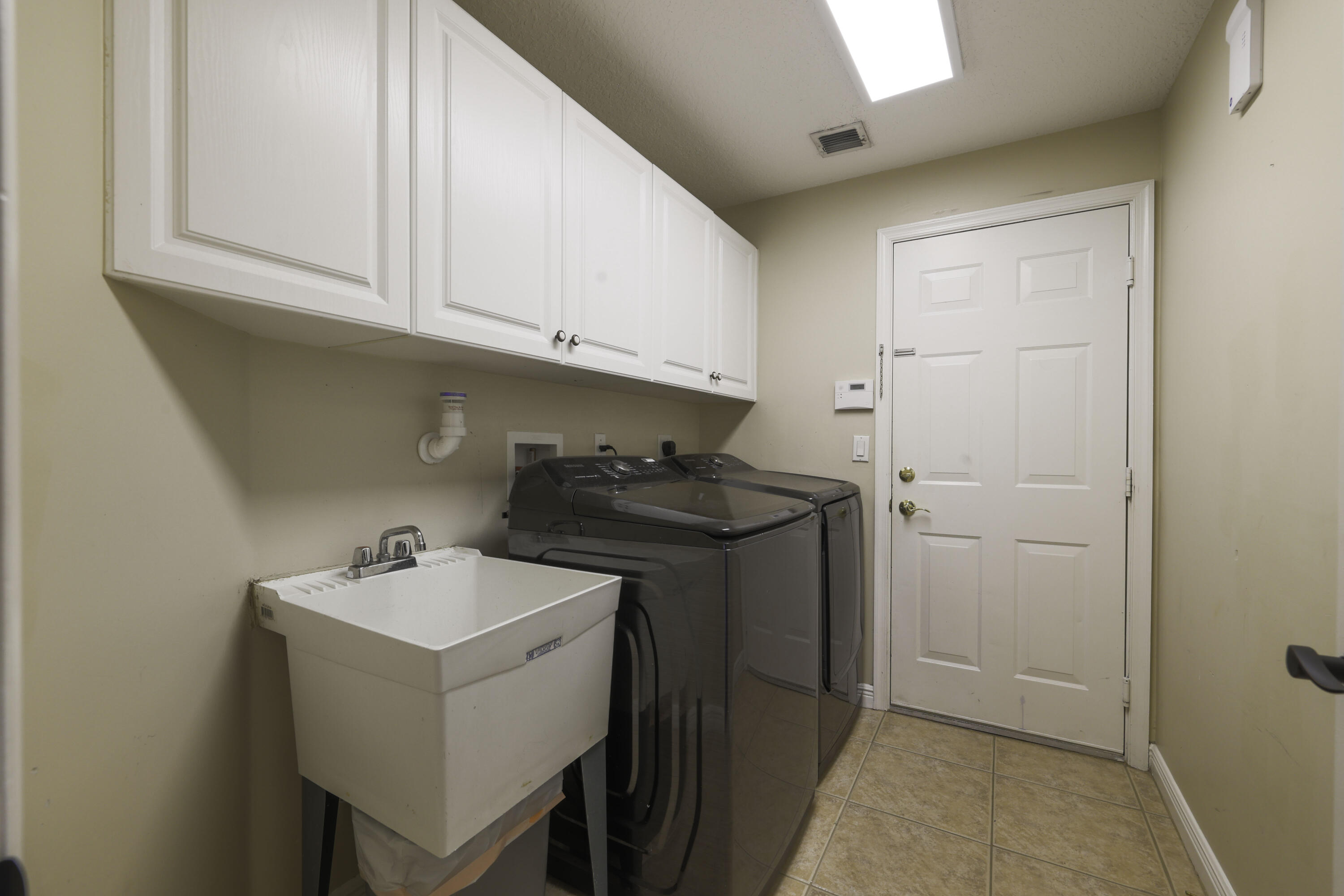 2291 Ridgewood Circle Royal Palm Beach, FL 33411 - Photo 43 of 71 2291 Ridgewood Circle - Laundry Room