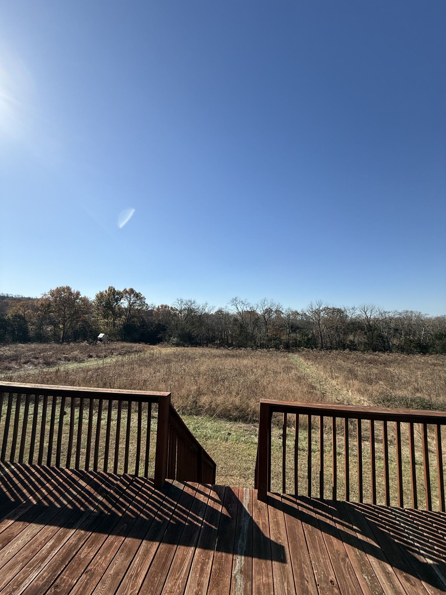 1002 Lock 5 Road Lebanon, TN 37087 - Photo 6 of 44 a view of balcony with wooden floor and lake view