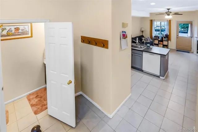 a kitchen with stainless steel appliances a refrigerator and a stove top oven