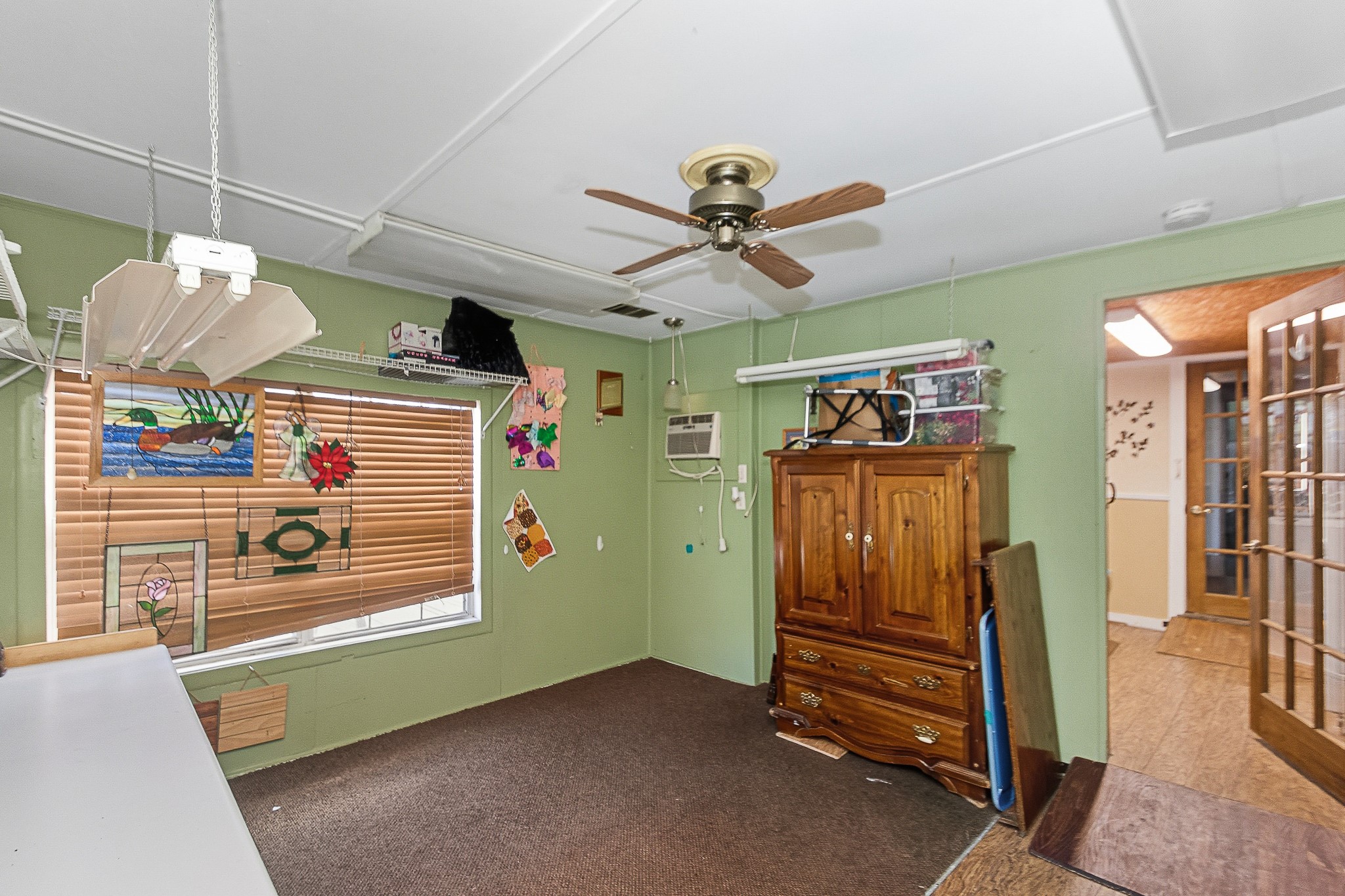 1406 West 6th Street Freeport, TX 77541 - Photo 19 of 25 a view of a livingroom with furniture and window
