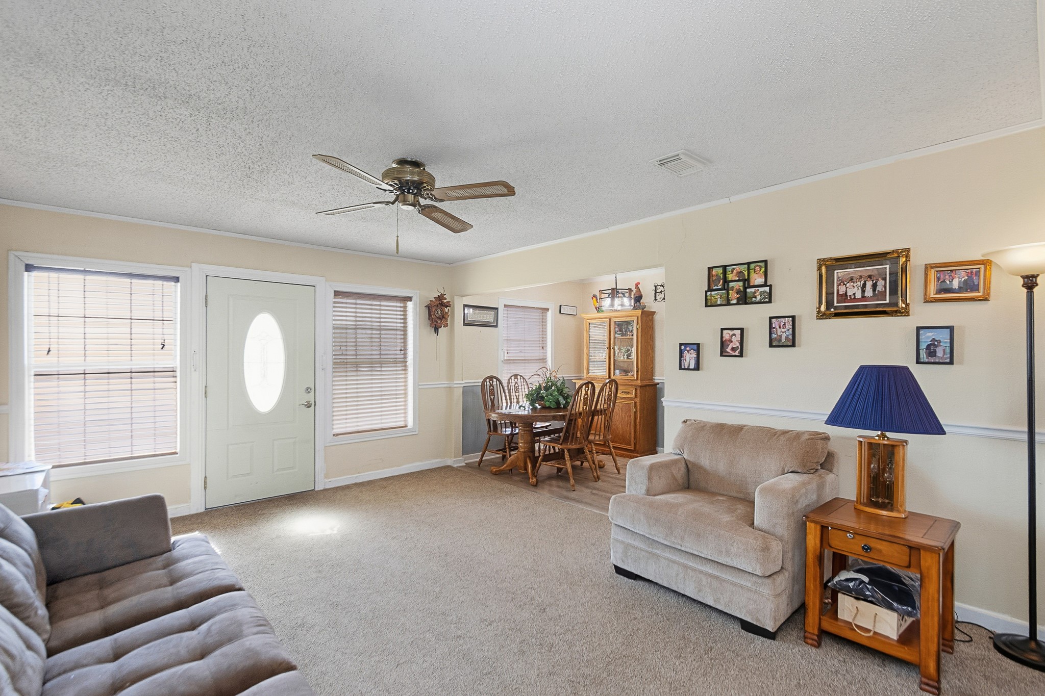1406 West 6th Street Freeport, TX 77541 - Photo 6 of 25 a living room with furniture and a large window