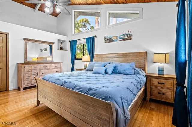 a spacious bathroom with a granite countertop sink and a mirror
