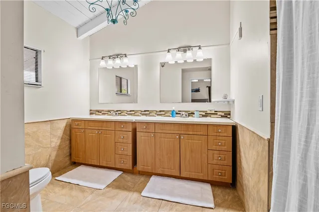 a view of a patio with a table and chairs